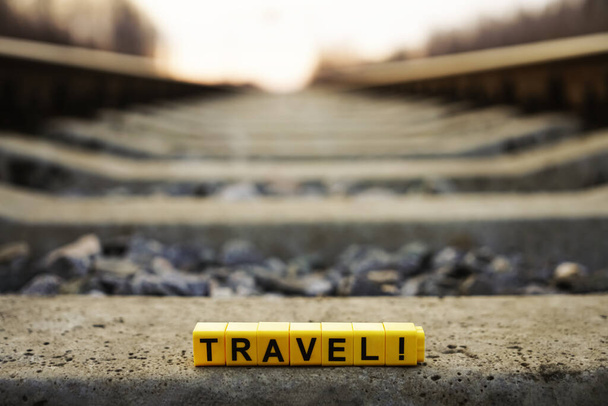 word travel . Railway with sun rays background - Φωτογραφία, εικόνα