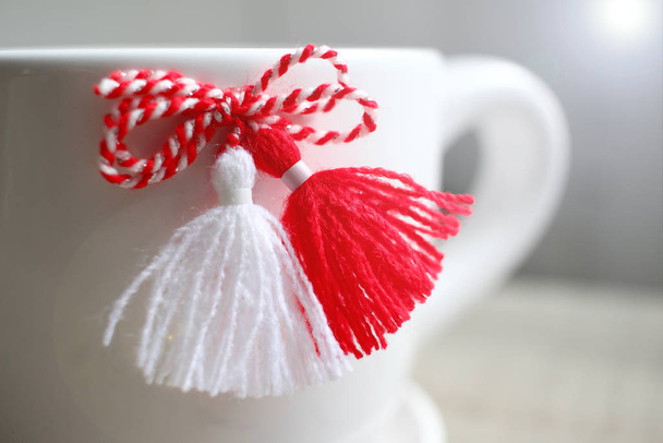 Bulgarian martenitsa or martisor. Traditional symbol of holiday baba Marta. National traditional symbol of red and white threads that people wears for good health. Baba Marta Day - Photo, Image