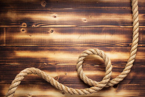 ship rope at wooden background - Photo, Image