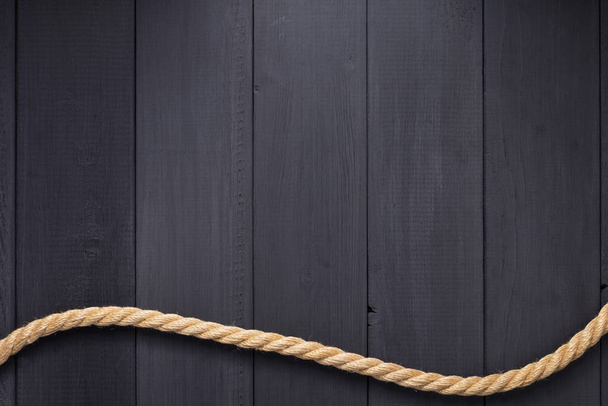 ship rope at wooden background - Fotografie, Obrázek