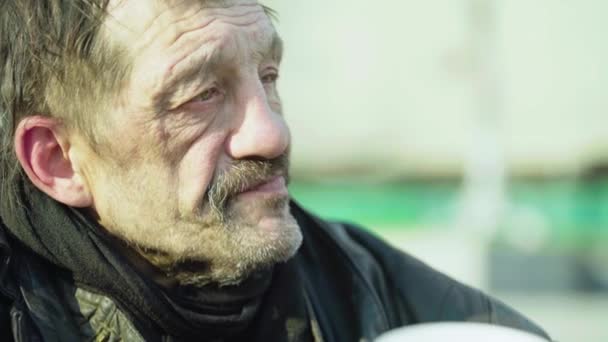 Beggar homeless man tramp. Poverty. Vagrancy. Kyiv. Ukraine. - Materiał filmowy, wideo