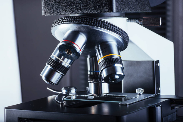 Close up of microscope at the laboratory - Foto, Bild