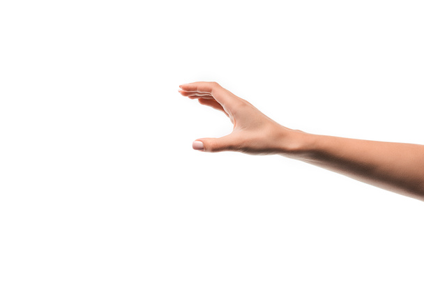 καλλιεργημένη άποψη της γυναίκας με απλωμένο χέρι απομονώνονται σε λευκό  - Φωτογραφία, εικόνα
