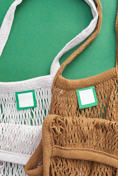 Brown and white color mesh eco bags - Photo, Image