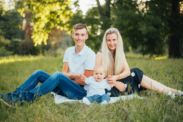happy family with baby son at summer  - Valokuva, kuva