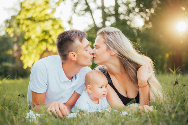 happy family with baby son at summer  - Foto, imagen