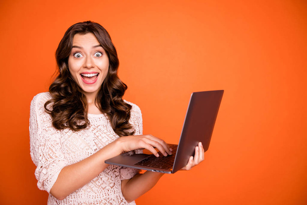 Portrait of crazy funky girl use laptop read social media news online shopping black friday bargain information impressed scream wow omg wear stylish clothing isolated vivid color background - Foto, imagen