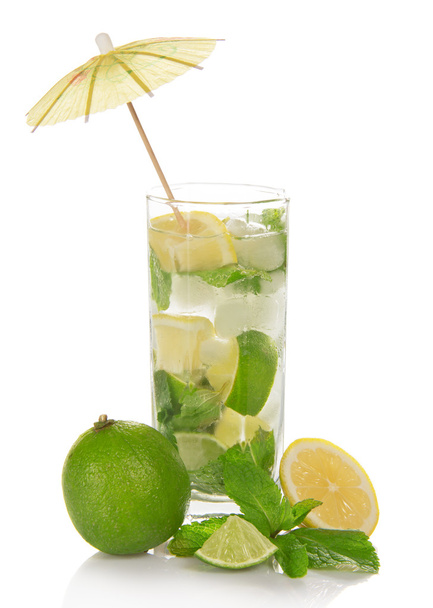 The glass of a cold mojito, is decorated with an umbrella, the spearmint - Fotografie, Obrázek