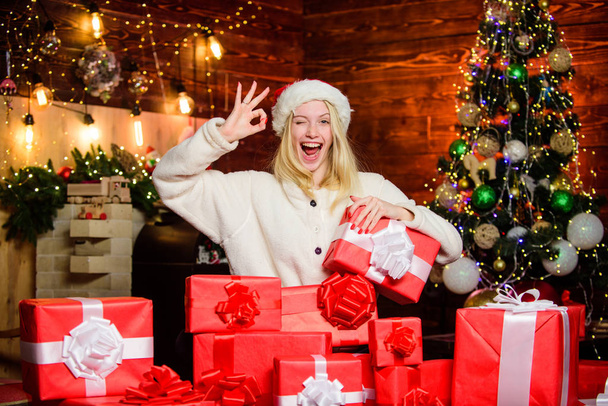 perfect day. happy woman love presents. Winter shopping sales. celebrate new year at home. xmas holiday gift. Decorate christmas tree. last preparation. Christmas time. cheerful girl red santa hat - Φωτογραφία, εικόνα