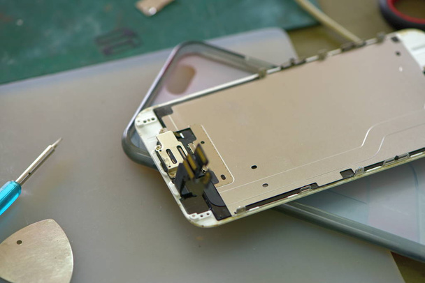close up of smartphone at repairing service   - Fotografie, Obrázek