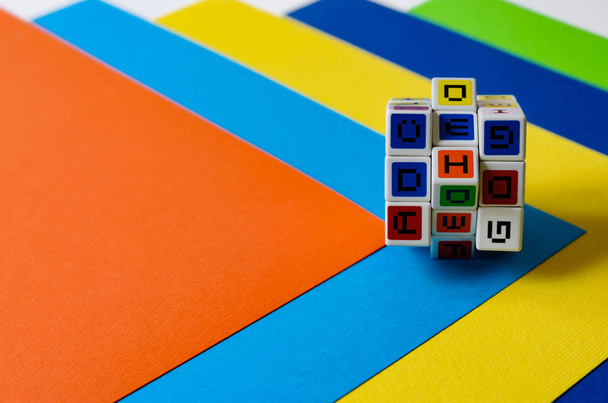 Puzzle with the alphabet on colorful sheets of paper. - Photo, Image