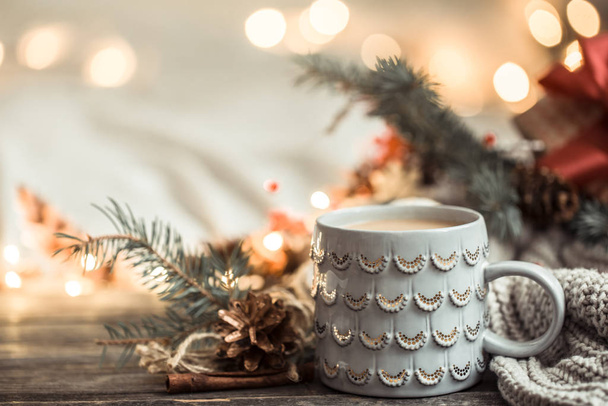 Festive background with Cup on wooden background with lights. - Foto, immagini