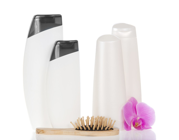 Set of cosmetics, orchid flower, the wooden hairbrush, isolated on white - Zdjęcie, obraz