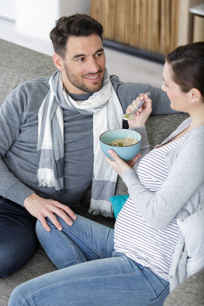 young couple eating cereal breakfast - Foto, immagini