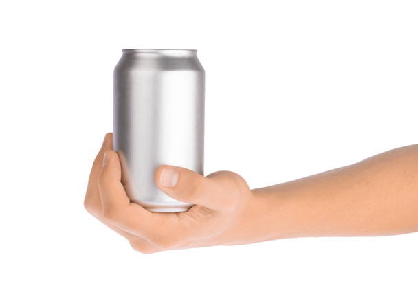 Hand holds metal beverage drink can isolated on white - Fotoğraf, Görsel