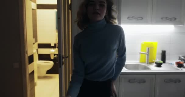Young happy woman dancing on her kitchen at night - Metraje, vídeo