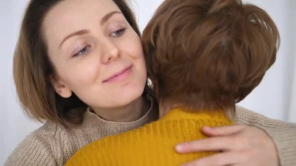 Daughter Embracing Her Old Mother. - Materiał filmowy, wideo