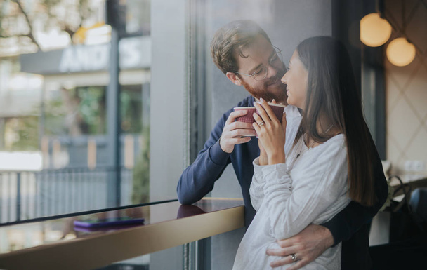Loving couple spending time in cafe - Photo, image