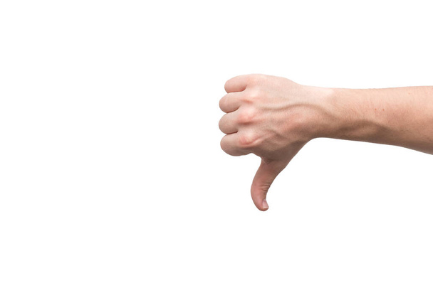 Hand thumb down isolated on white background. Rejection symbol. - Photo, Image