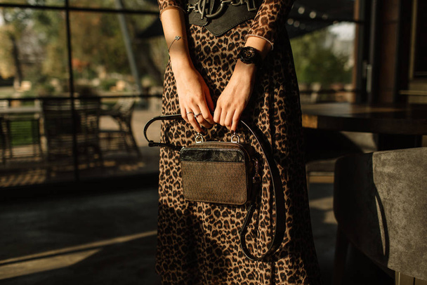 Close up fashion details, young business woman holding bag, warm - Foto, Imagem