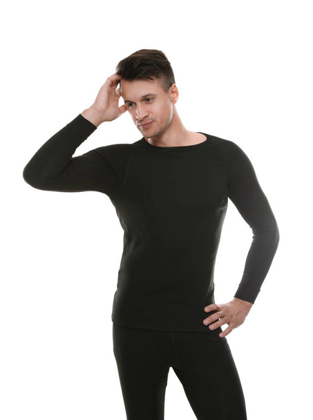 Man wearing thermal underwear isolated on white - Foto, imagen
