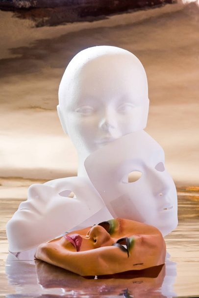 White mannequin head and masks - 写真・画像