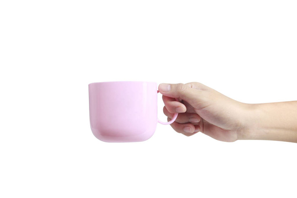 Рука тримає пластикову чашку, як заливка
 - Фото, зображення
