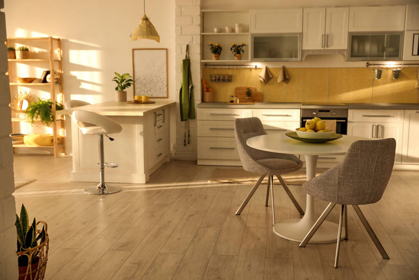 Modern kitchen interior with stylish white furniture - Φωτογραφία, εικόνα