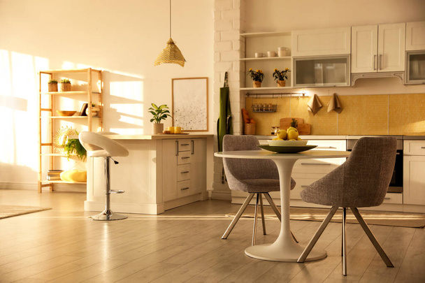 Modern kitchen interior with stylish white furniture - Фото, зображення