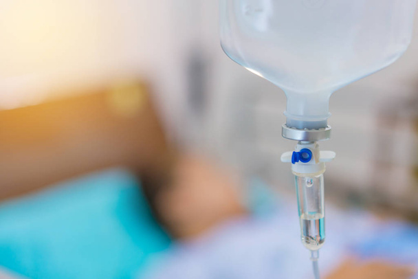 Normal saline solution or sodium chloride with infusion bottle d - Foto, afbeelding