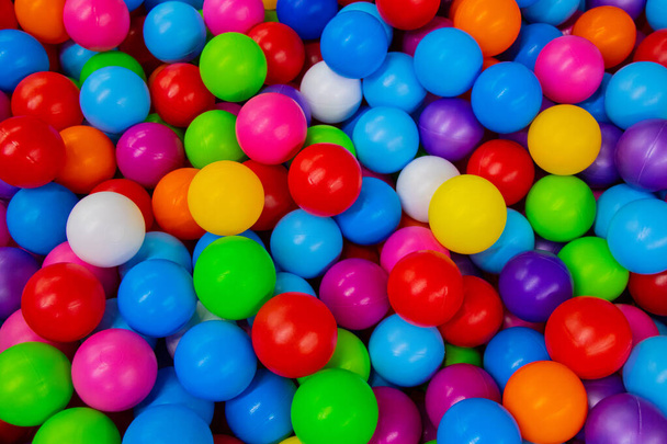 many multi-colored plastic balls as a background - Photo, Image