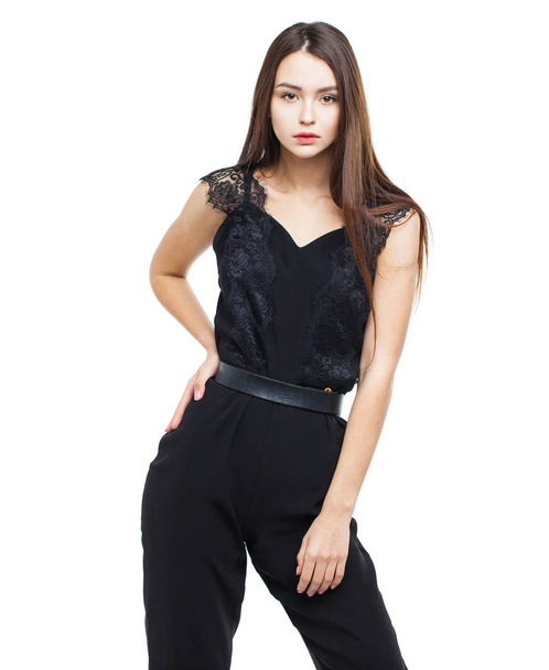 Full body, beautiful brunette woman in a black blouse and pants - Photo, Image