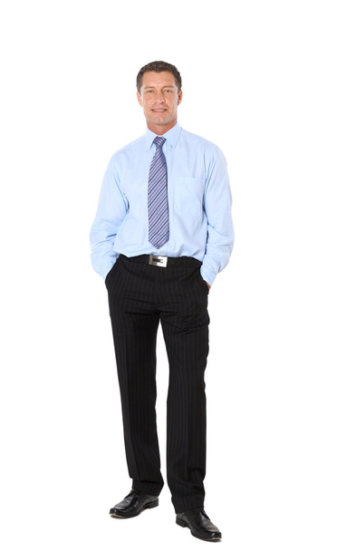 Full length portrait of a successful mature business man with hands folded - Foto, immagini
