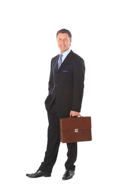 Full length portrait of a successful mature business man with hands folded - Φωτογραφία, εικόνα