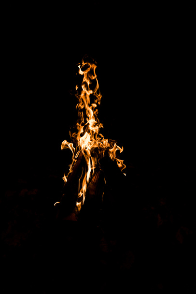 logs burning in camp fire isolated on black - Foto, Imagem