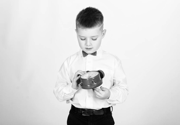 Party time. Businessman. Formal wear. happy child with retro clock in bow tie. little boy with alarm clock. Time to relax. Time management. Morning. tuxedo kid. Happy childhood. fun time - Photo, image