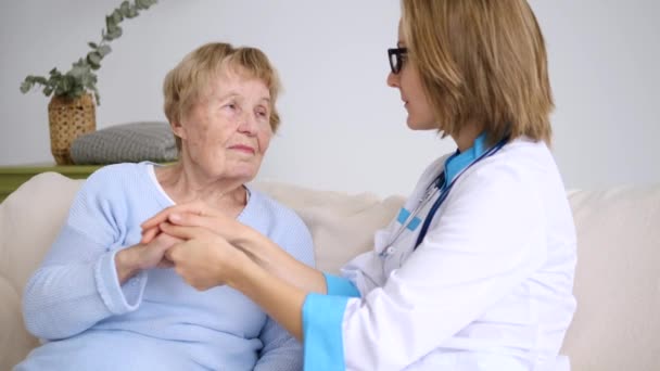 Doctor With Senior Patient. Assistance And Elderly Care Concept. - Filmagem, Vídeo