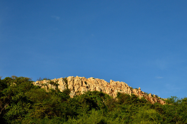 Cliff on clear sky - Photo, Image