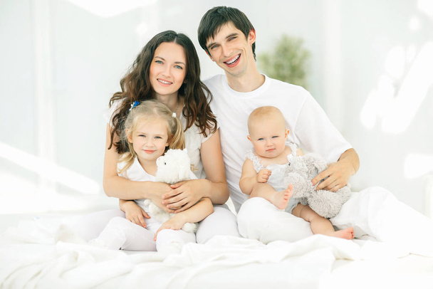 background image of a young happy family. - Photo, image