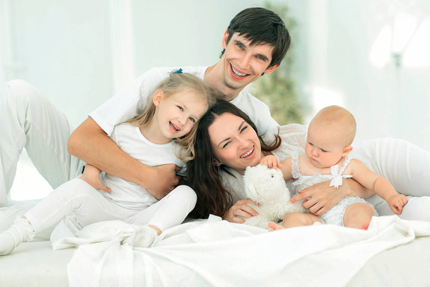 background image of a happy young family - Photo, image