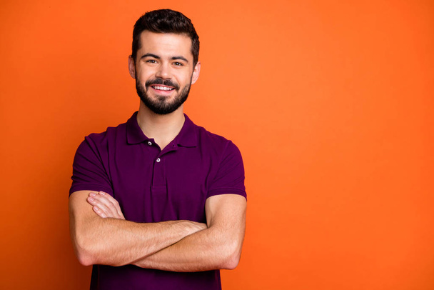 Portrait of confident positive guy feel candid emotions cross hands enjoy free time wear stylish clothing isolated over vivid color background - Φωτογραφία, εικόνα