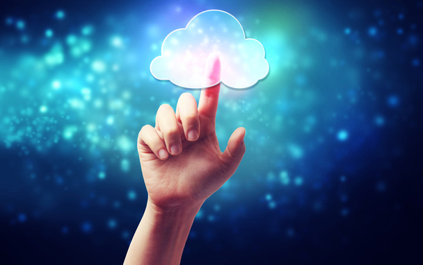 Cloud computing symbol being pressed by a persons hand - Φωτογραφία, εικόνα