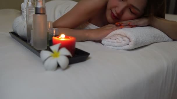 Asian beautiful woman relaxing in spa salon  - Felvétel, videó