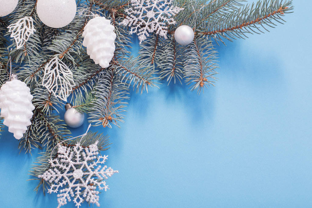 Christmas decorations on blue paper background  - Foto, Imagen