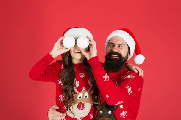 Lovely family. Play with snowballs. Winter holidays. Cheerful christmas to all. Greetings. Sincere emotions. Christmas tradition. Father hug little daughter. Small child with dad celebrate christmas - Photo, image