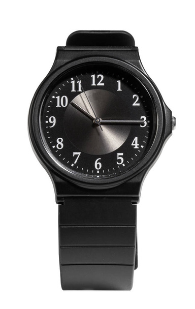 KIEV, UCRANIA - 03 DE DICIEMBRE DE 2019: reloj de pulsera de plástico negro fabricado por CASIO. El modelo clásico. Reloj Cavariano
 - Foto, imagen