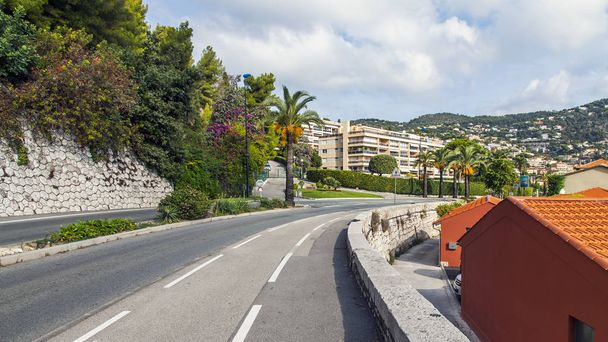 Villefranche-sur-Mer, France, October 10, 2019. Picturesque mountain road along the sea - Photo, Image