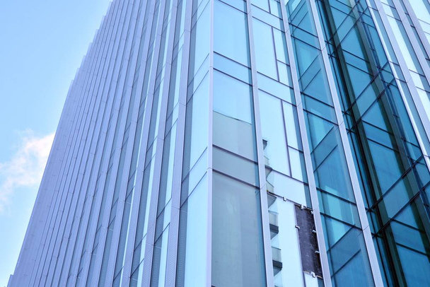 Abstraktní textura modrého skla moderních stavebních mrakodrapů. Obchodní zázemí. - Fotografie, Obrázek