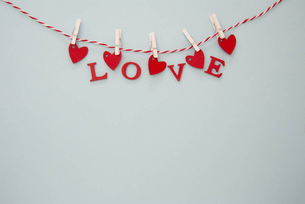 Love letters hanging on a rope. Abstract Valentine's Day background with copy space. - Foto, immagini