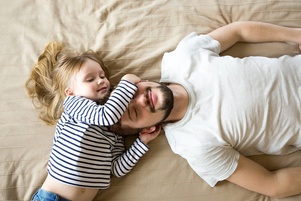 Happy fathers day! Loving father and his daughter hugging. - 写真・画像